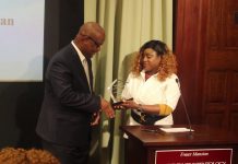Dr. Demby and Minister Counselor Sillah collect Awards for Exemplary Leadership